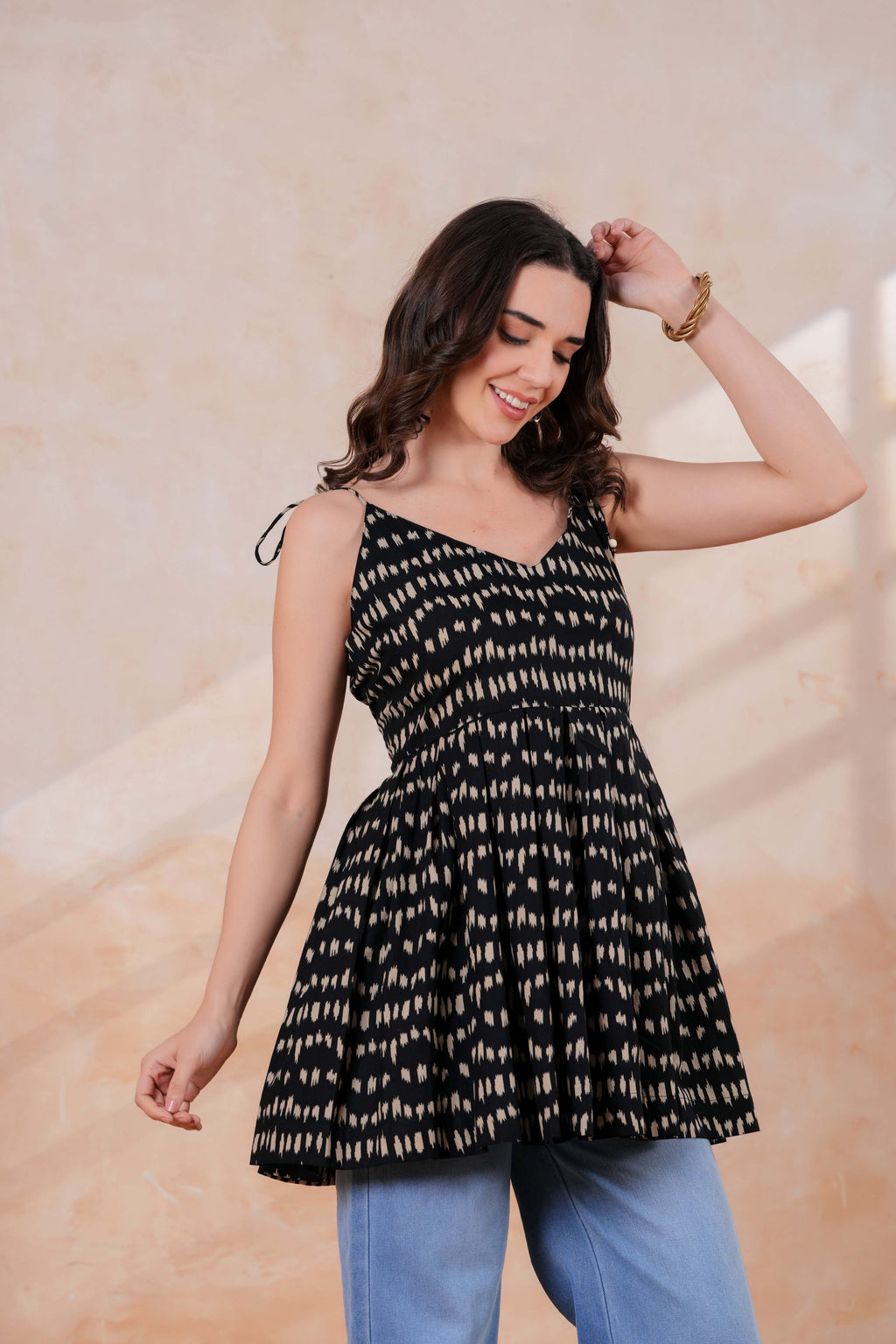 Women’s Black Printed Sleeveless Flared Peplum Top with Tie-Up Straps