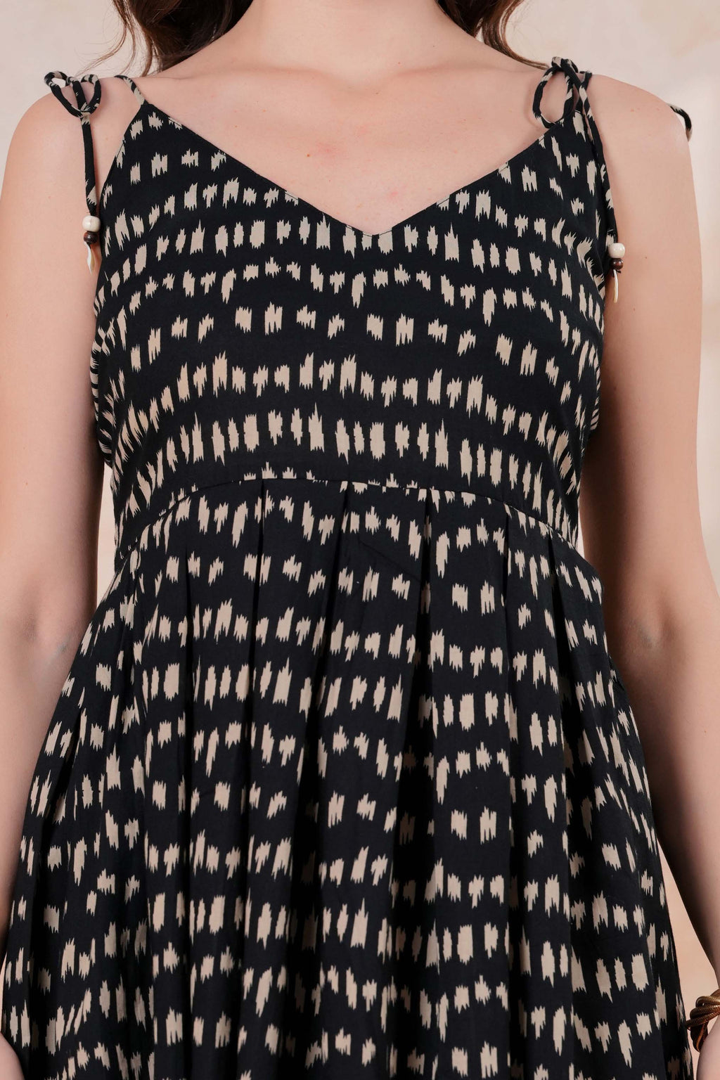 Women’s Black Printed Sleeveless Flared Peplum Top with Tie-Up Straps